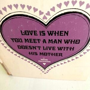 Vintage Book “Love is when you meet a man who doesn’t live with their mother”
